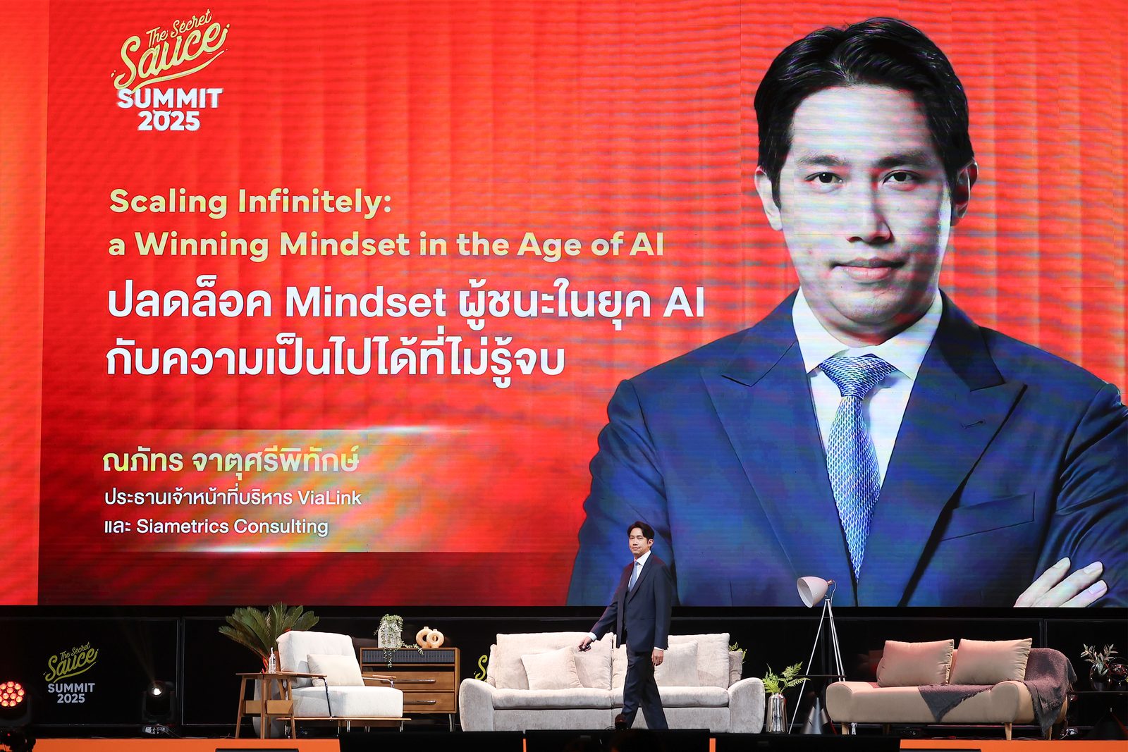 Dr. Napat keynote on stage